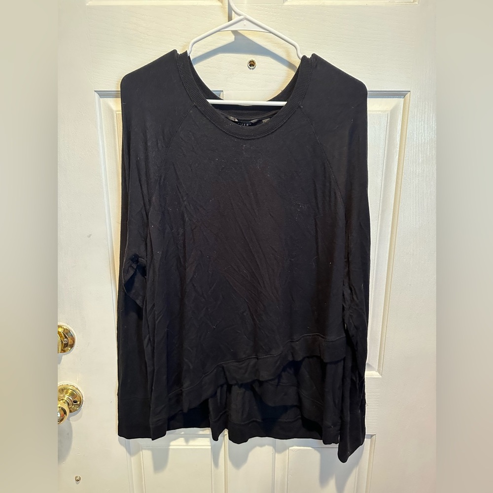 Black Athleta long sleeve tunic sweater with criss cross hem